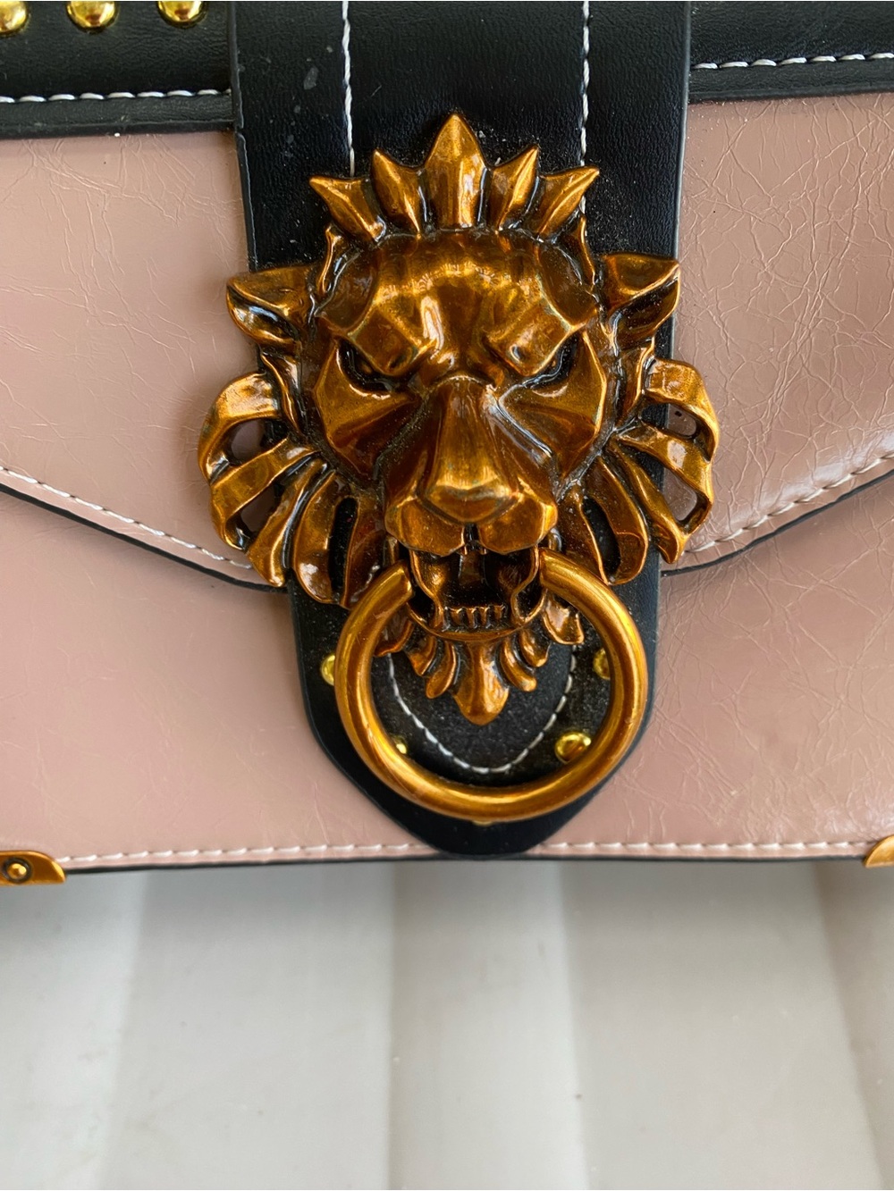 Women’s Pink Leather Crossbody Bag with Gold Lion-Head Accent